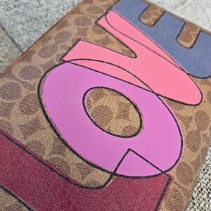 Coach Charlie Pouch In Signature Canvas